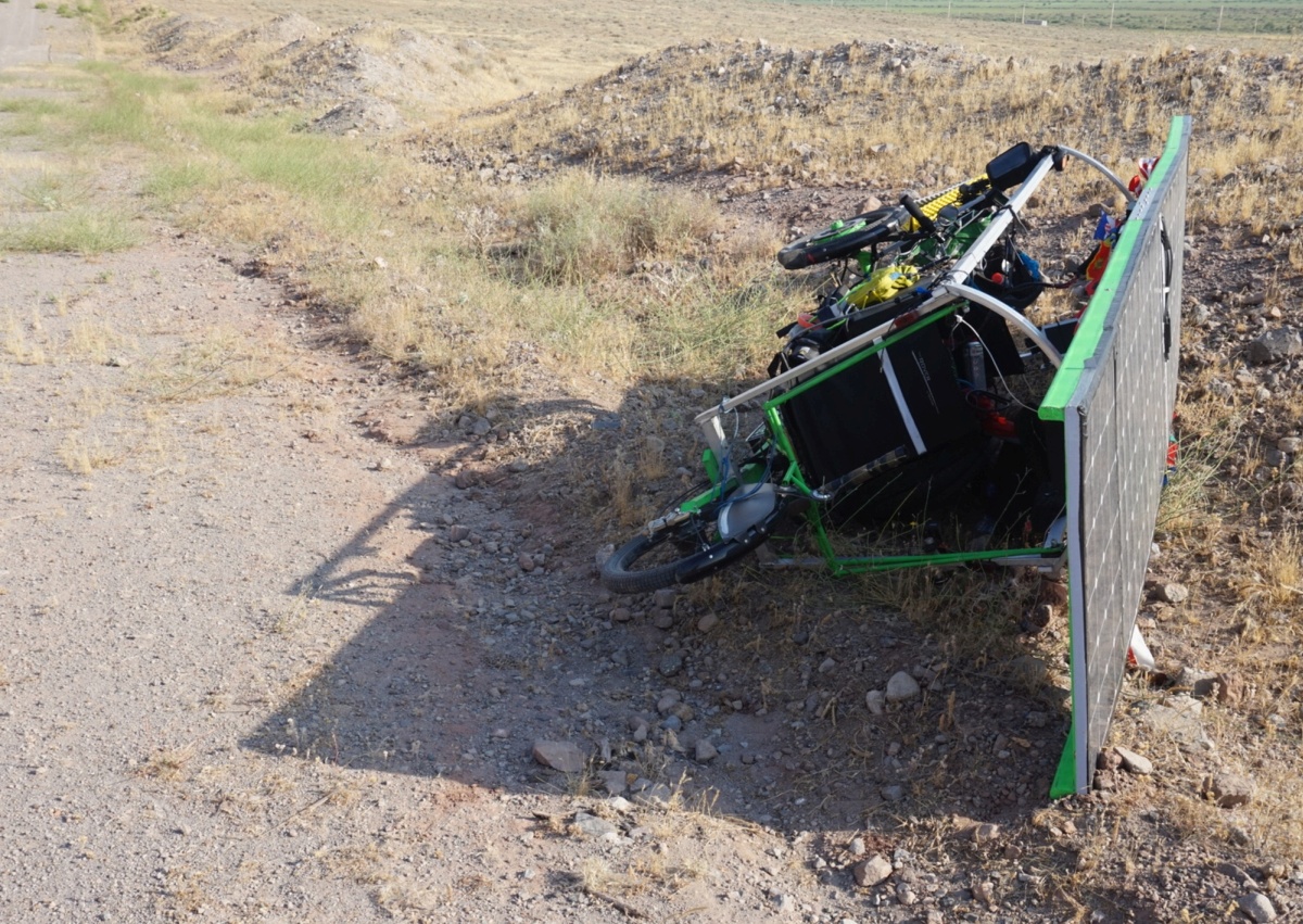 Our 2nd night in Iran we camped in the rather barren fields. At first it looked idylic, but when the winds picked up overnight things got increasing precarious until they blew down our tent and made sleep impossible.At least the trike blew over such that it faced the morning sun!