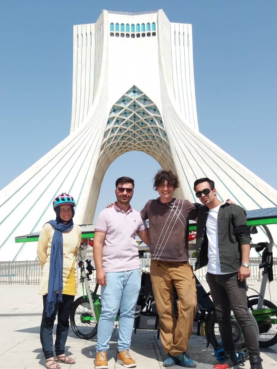 We thought we'd honor the very last selfie photo of random strangers posing with the trike. These guys ended up being interviewed during the press meeting and made it on TV.