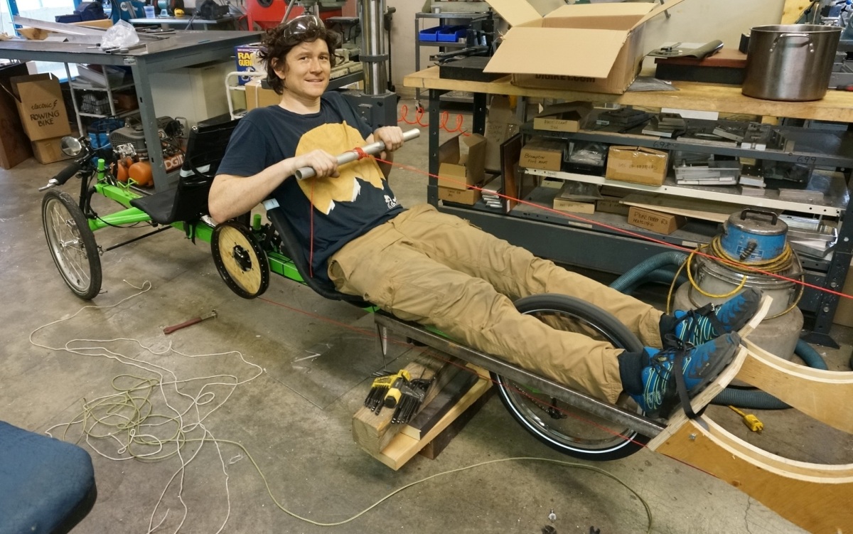 The first prototype of the rowing systme used a linear rail with a plywood carriage for the foot rest and rope pulleys. It worked, but the complexity of linear slides reduced the appearl.