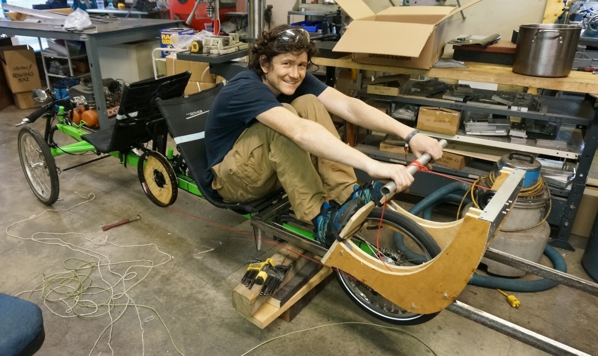 In the catch position of the first prototype rowing rig, ready to push with the legs and the pull with the arms and back.